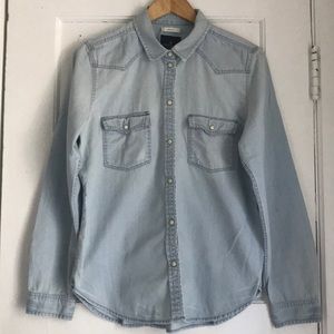 Faded, distressed and cozy chambray shirt